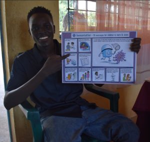 Digital Lion, Jospeh show us the immunisation poster