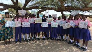 Children in Kenya with their posters