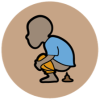 A child in a blue shirt is squatting to take a poo.